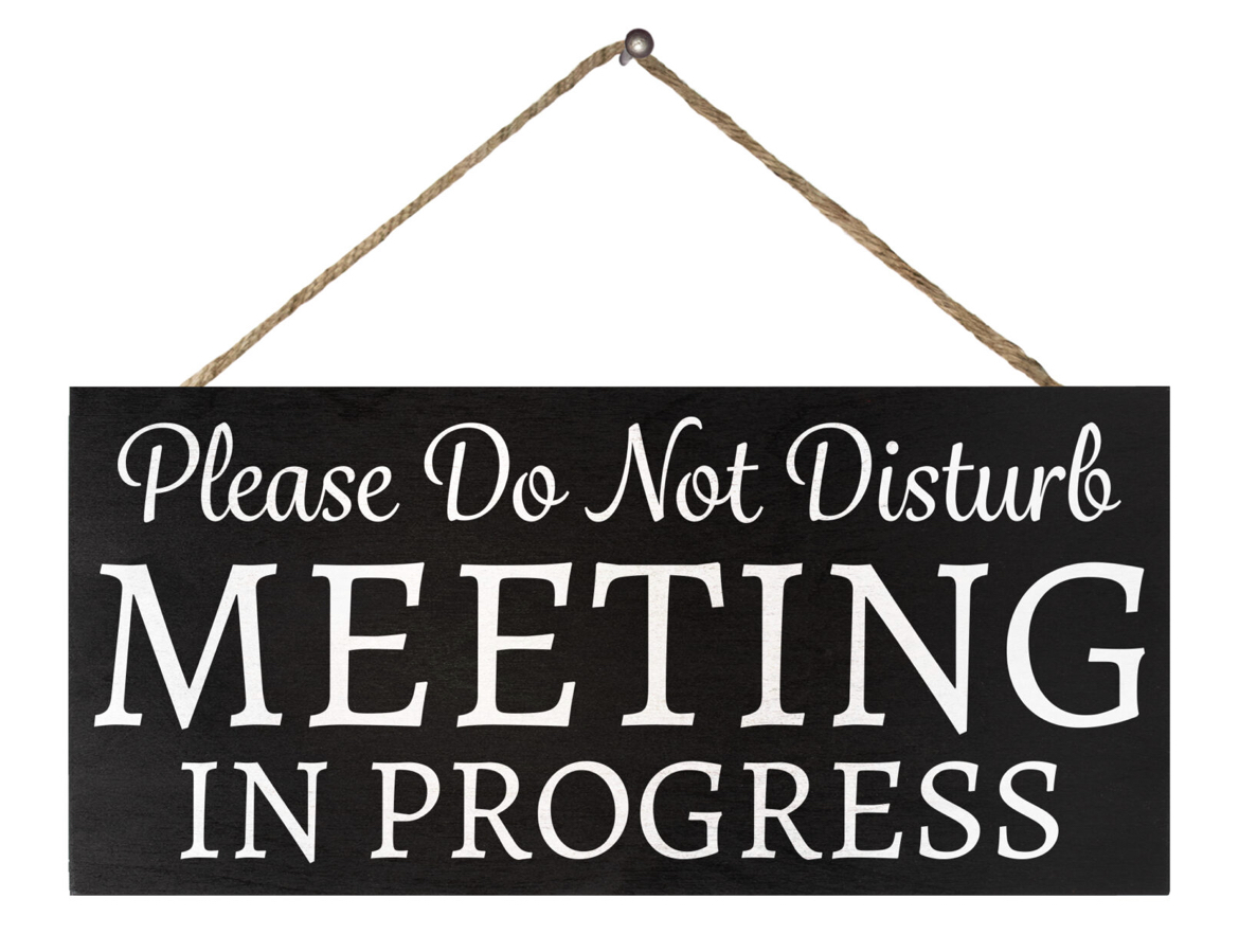 Do not disturb. Meeting in Progress sign