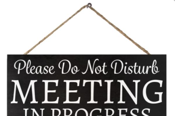 Do not disturb meeting sign